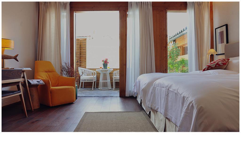 Woobay Hotel Лицзян Экстерьер фото
